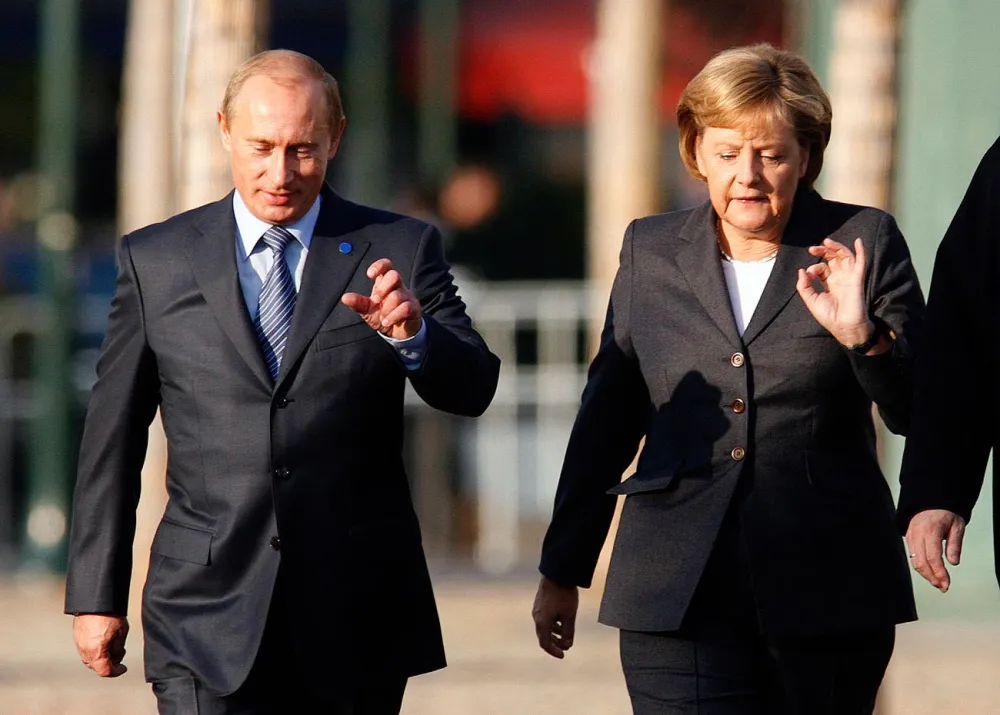 Путин и Меркел