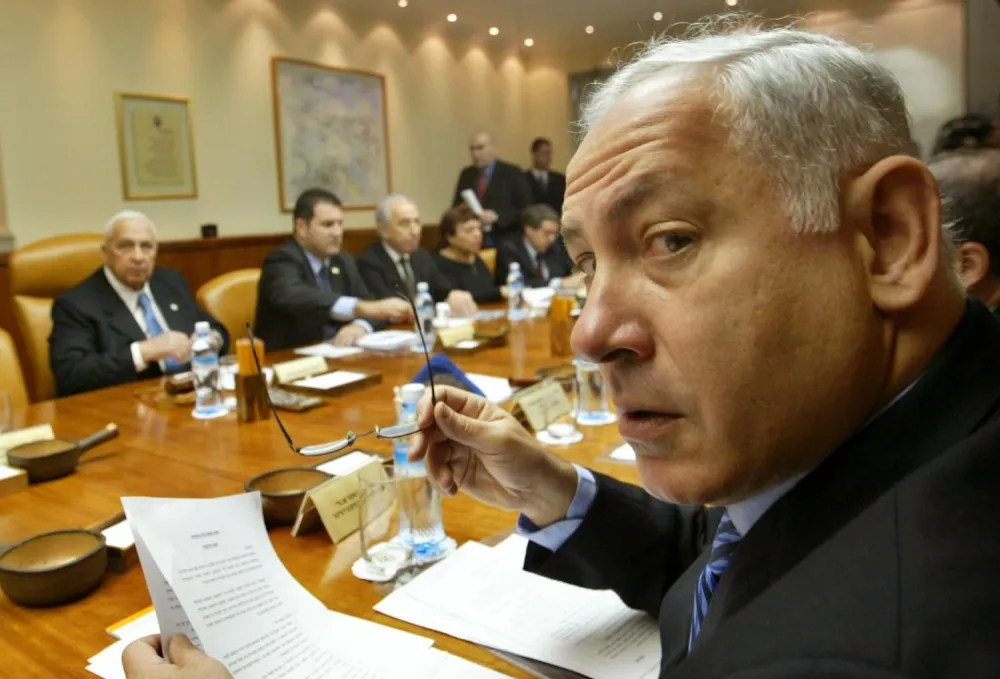 Mesto: Jerusalim<br>Datum: 20.02.2005<br>Dogadjaj: izraelski ministar finansija Benjamin Netanijahu na nedeljnoj sednici kabineta u Jerusalimu<br>Licnosti: Benjamin Netanjahu<br>