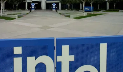 ** FILE ** Intel Corp. headquarters are seen in Santa Clara, Calif., Friday, Sept. 22, 2000. Intel Corp. reports its first-quarter earnings, Tuesday, April 13, 2004. Analysts expect the chip maker to post a profit of 27 cents per share on sales of .2 billion. (AP Photo/Paul Sakuma)
