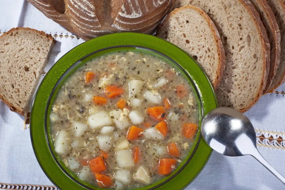 Soup - homemade potato soup with carrot and bread
