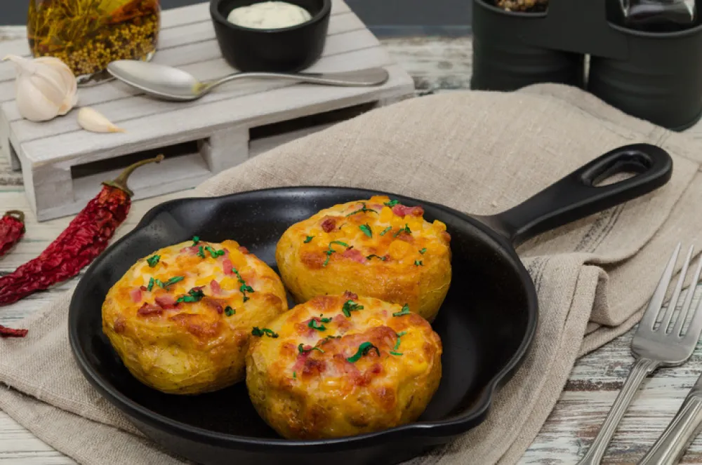 Stuffed potato with bacon, cheese and sweet corn