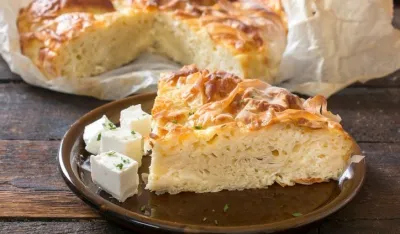 Slice of cheese pie called bure,selective focus