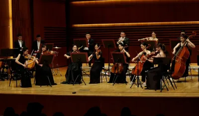 Članovi Čang&scaron;a simfonijskog orkestra na sceni MCCG